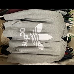 Grey adidas hoodie.